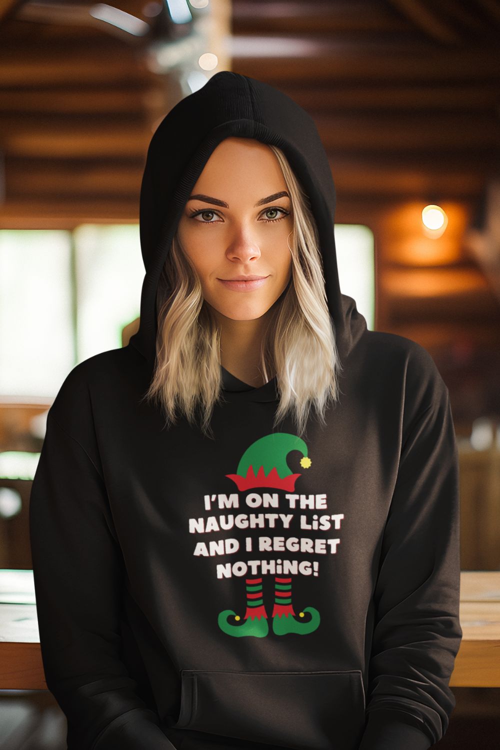 Women’s Christmas Hoodie – "I'm on the Naughty List, and I Regret Nothing" – Funny Festive Hoodie