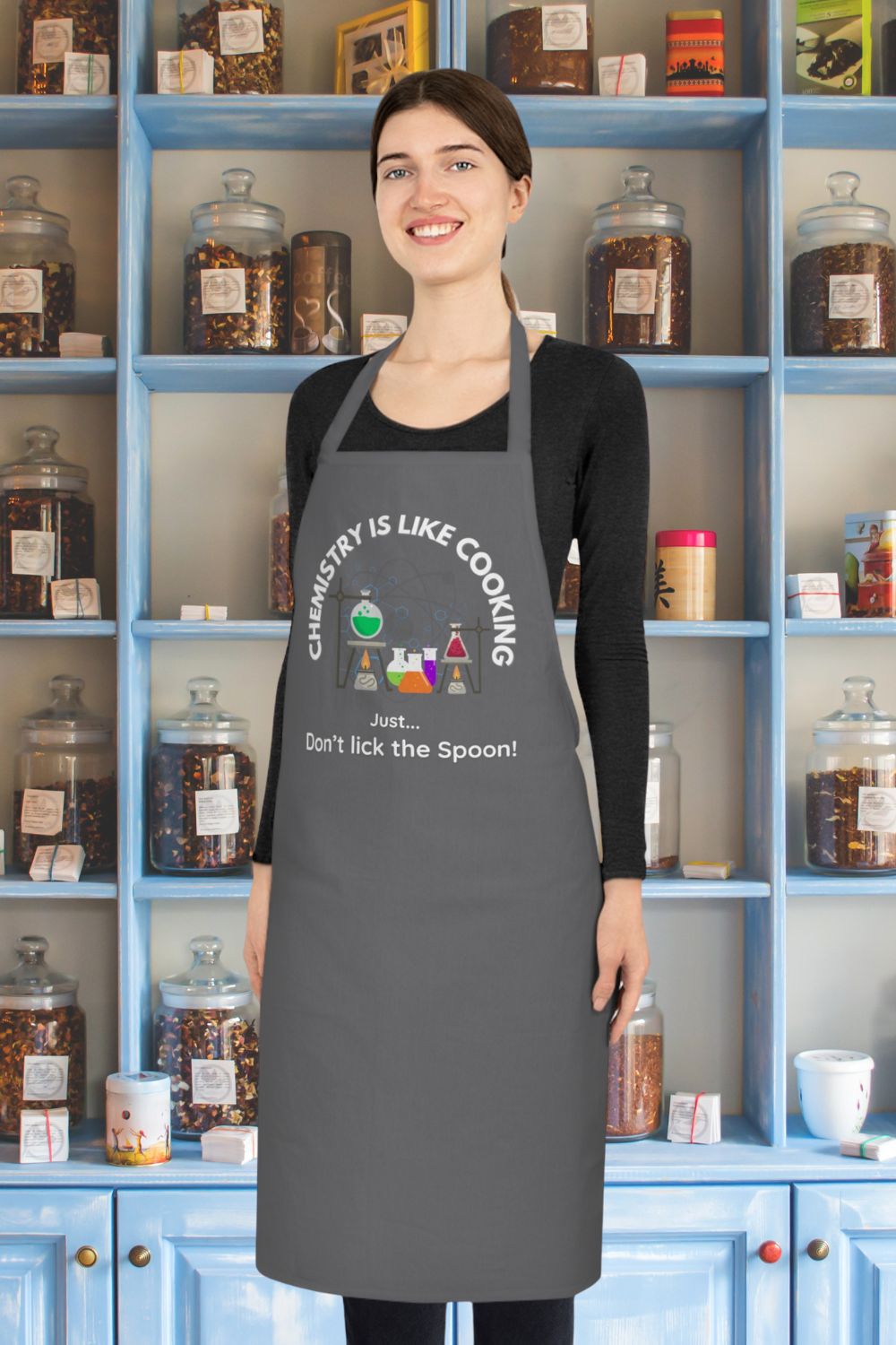 Funny Science Apron – "Chemistry Is Like Cooking... Just Don’t Lick the Spoon!" (Black, Grey, Red)