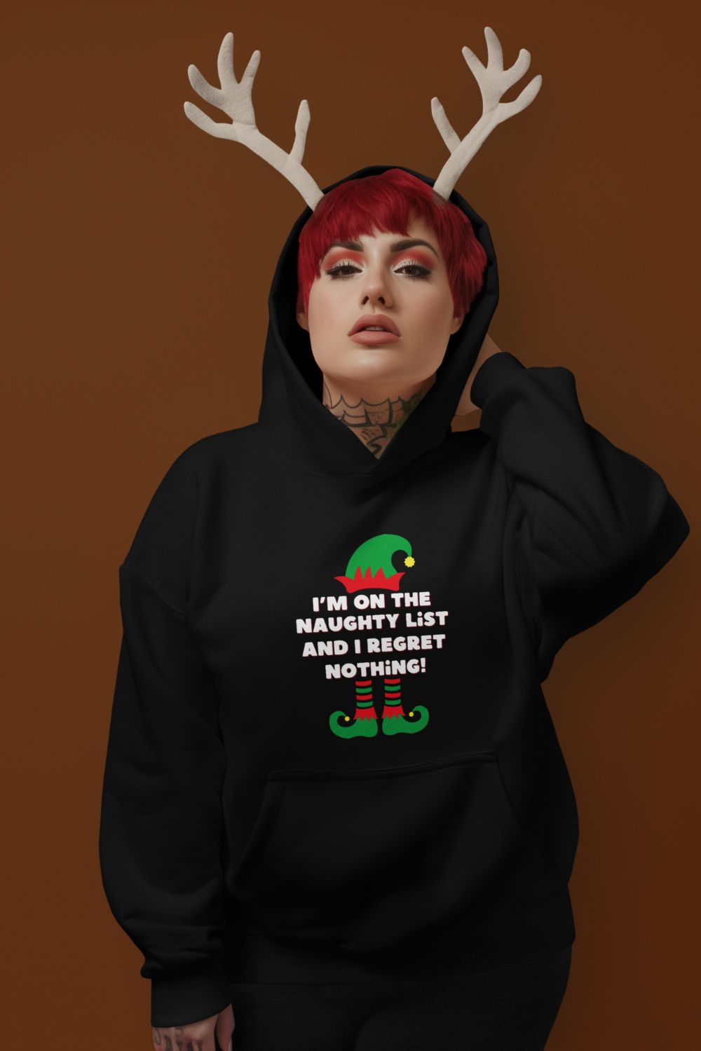 Women’s Christmas Hoodie – "I'm on the Naughty List, and I Regret Nothing" – Funny Festive Hoodie